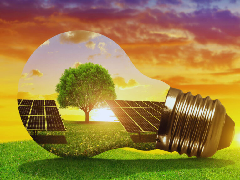 solar-energy-panels-inside-light-bulb-sunset-eco-innovation-concept